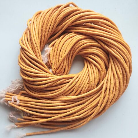 4 mm. African vinyl beads, carrot orange