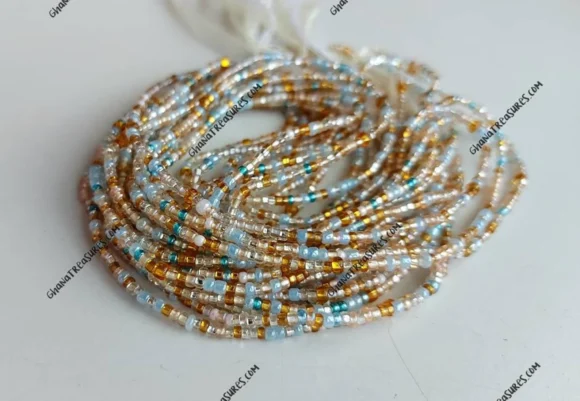 Gold, silver, light blue and pale pink waist beads