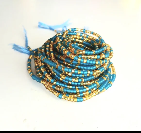 Frosted bright blue and gold waist beads