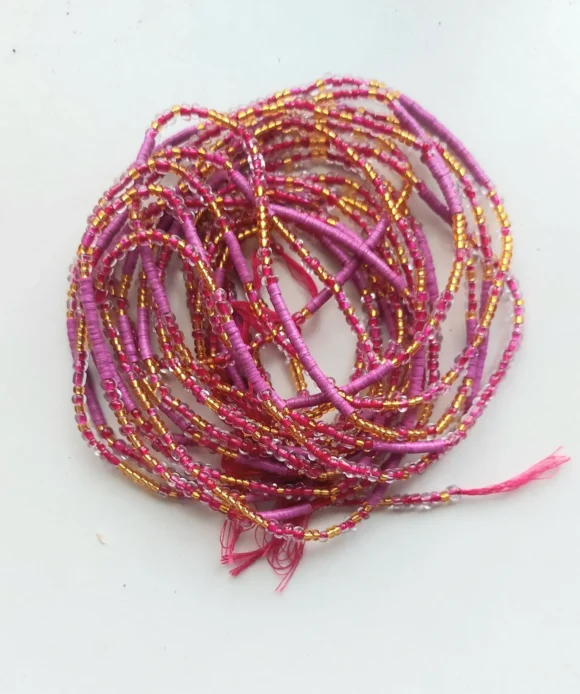 Deep pink and gold waist beads, glass and vinyl - Image 2