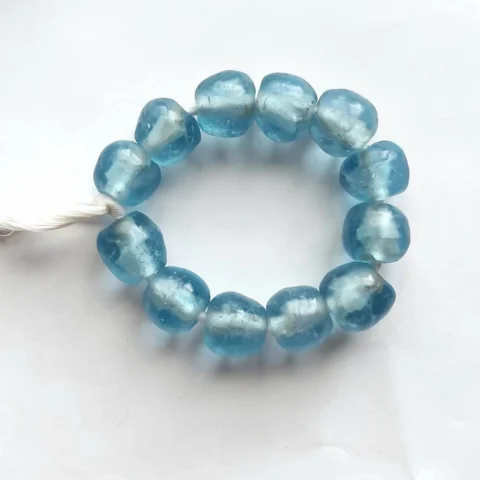 13 recycled glass beads, 21-22 x 16-17 mm., light blue