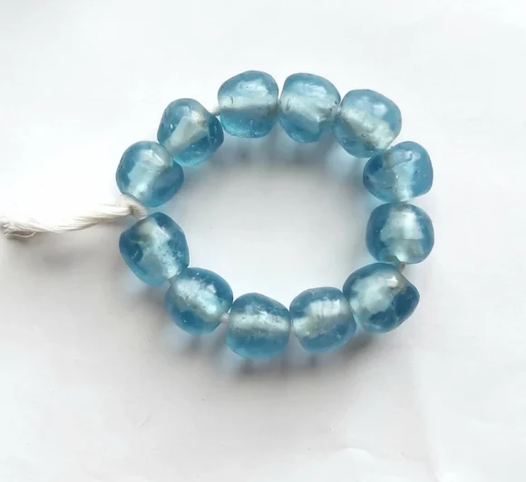 13 recycled glass beads, 21-22 x 16-17 mm., light blue