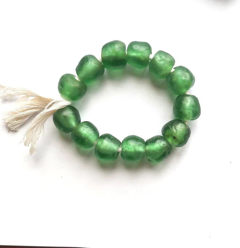 13 recycled glass beads, 17-18 x 16-17 mm. 13 recycled glass beads, 17-18 x 16-17 mm.