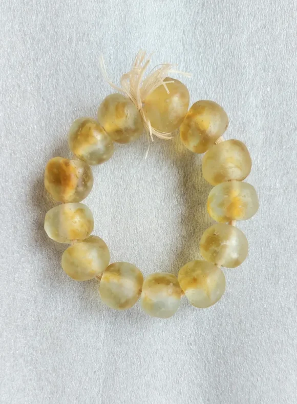 13 recycled glass beads, 20-21 x 18-20 mm.