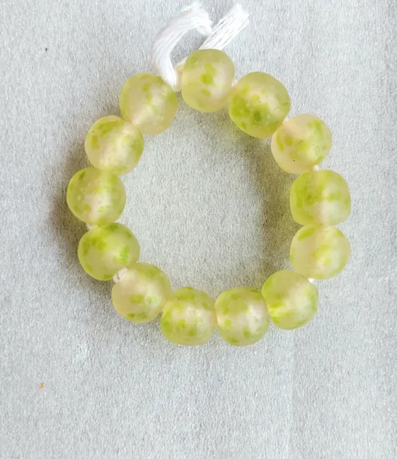 13 recycled glass beads, 20-21 x 18-20 mm.