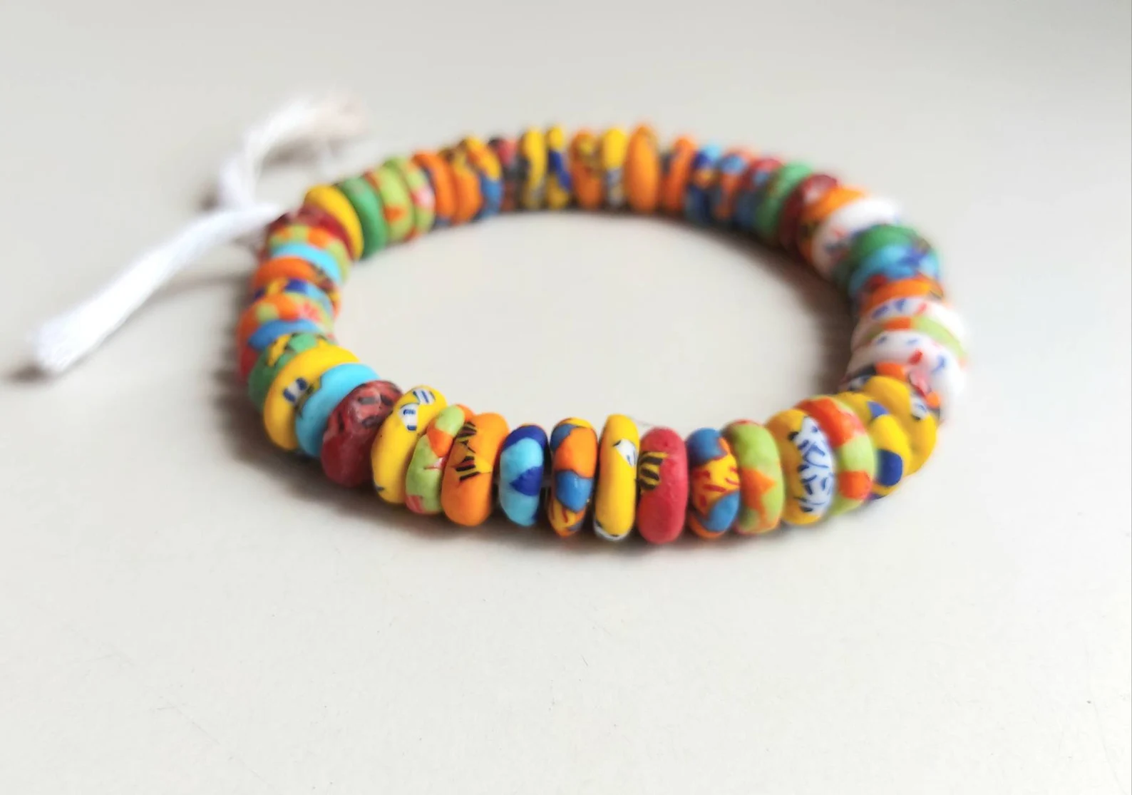 50 melted glass rondelle beads, 10-11 mm.diameter 50 melted glass rondelle beads, 10-11 mm.diameter