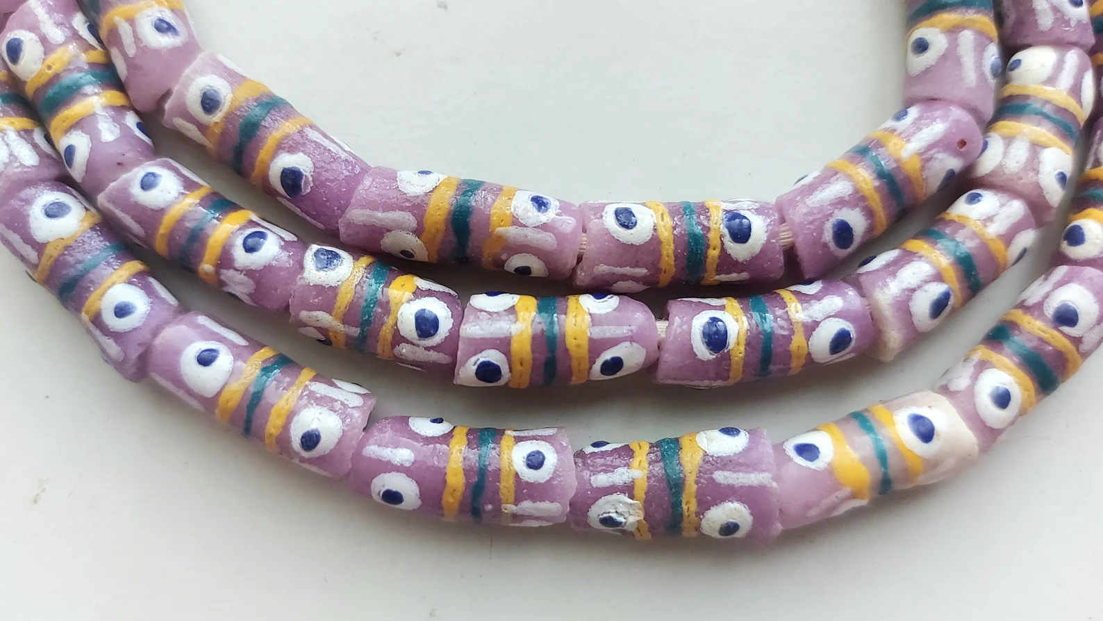 26 inches strand, African small painted beads, 7-8 x 16-18 mm., lilac 26 inches strand, African small painted beads, 7-8 x 16-18 mm., lilac