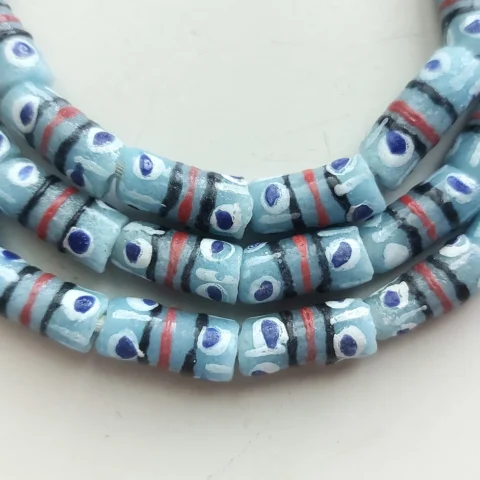 26 inches strand, African small painted beads, 7-8 x 16-18 mm., light blue