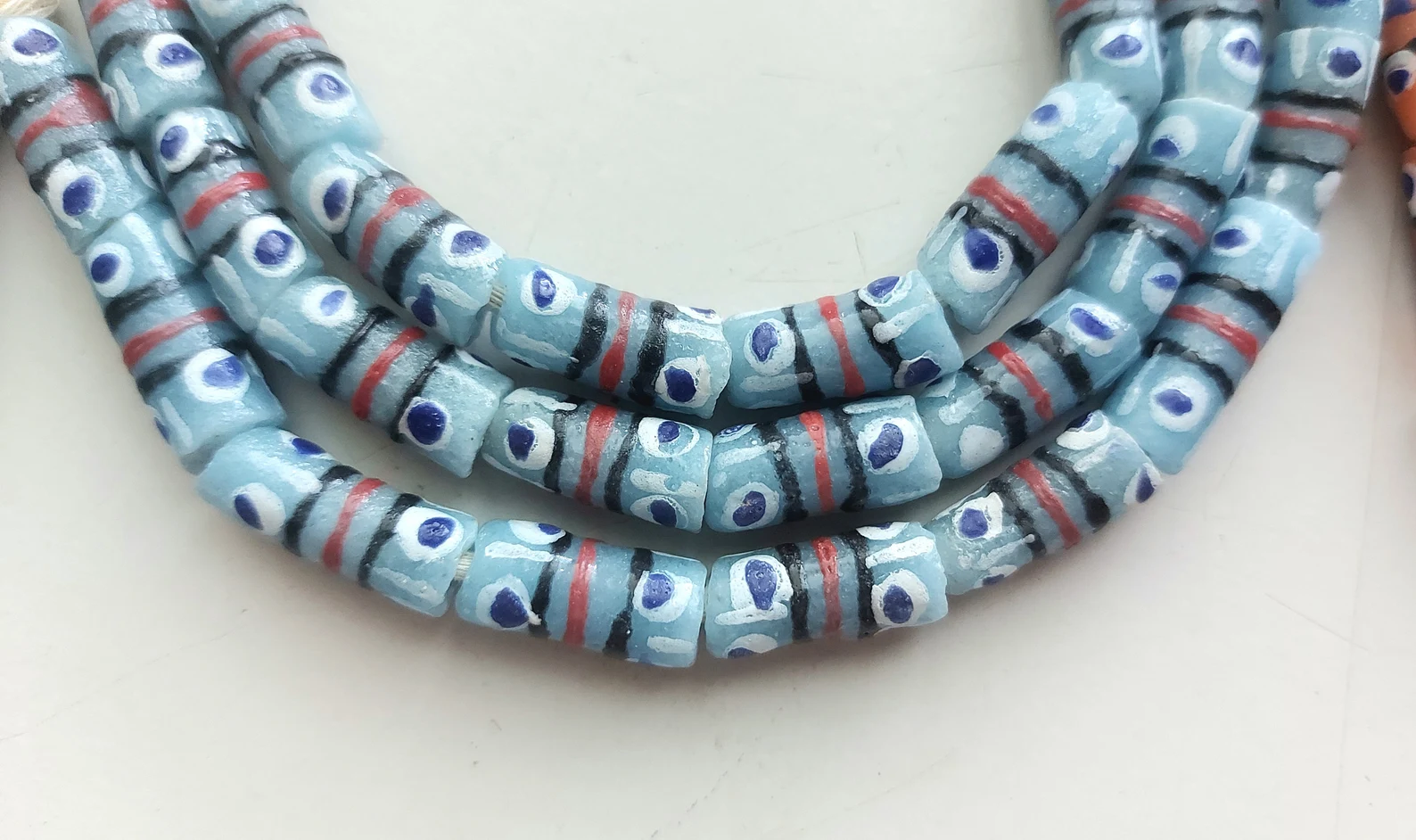 26 inches strand, African small painted beads, 7-8 x 16-18 mm., light blue 26 inches strand, African small painted beads, 7-8 x 16-18 mm., light blue