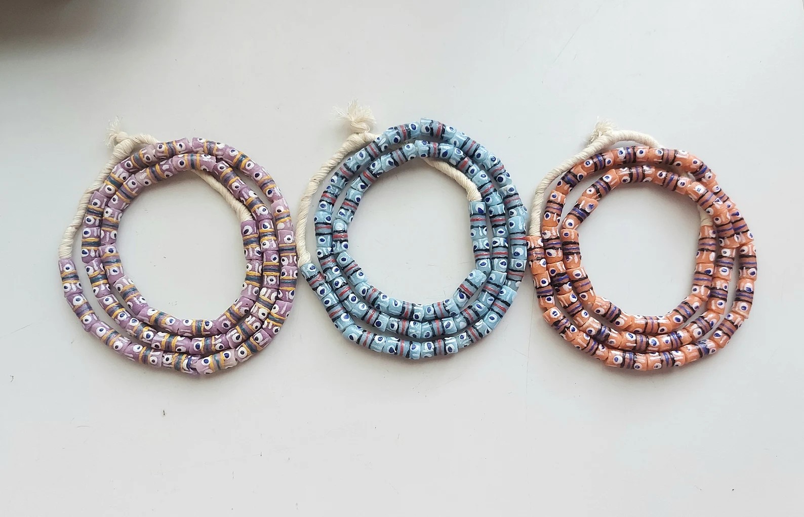 26 inches strand, African small painted beads, 7-8 x 16-18 mm., peach orange 26 inches strand, African small painted beads, 7-8 x 16-18 mm., peach orange - Image 2