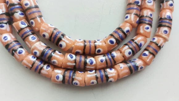 26 inches strand, African small painted beads, 7-8 x 16-18 mm., peach orange