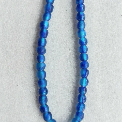 43 recycled glass beads. mottled blue