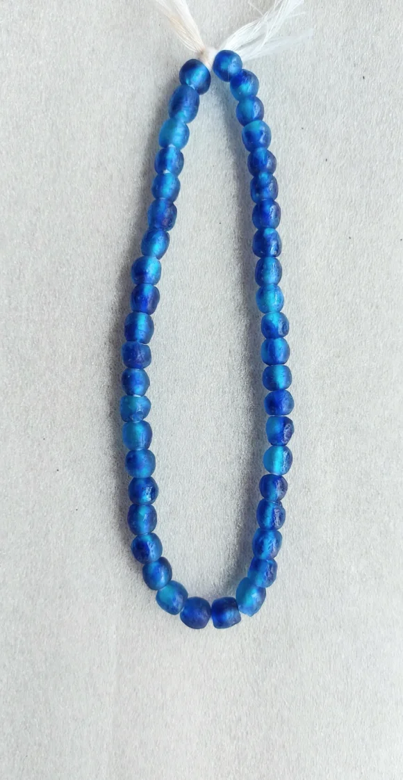 43 recycled glass beads. mottled blue
