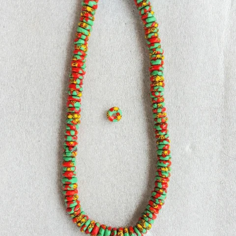 100+ African melted glass spacers, rondelle beads, 10-11 mm.diameter