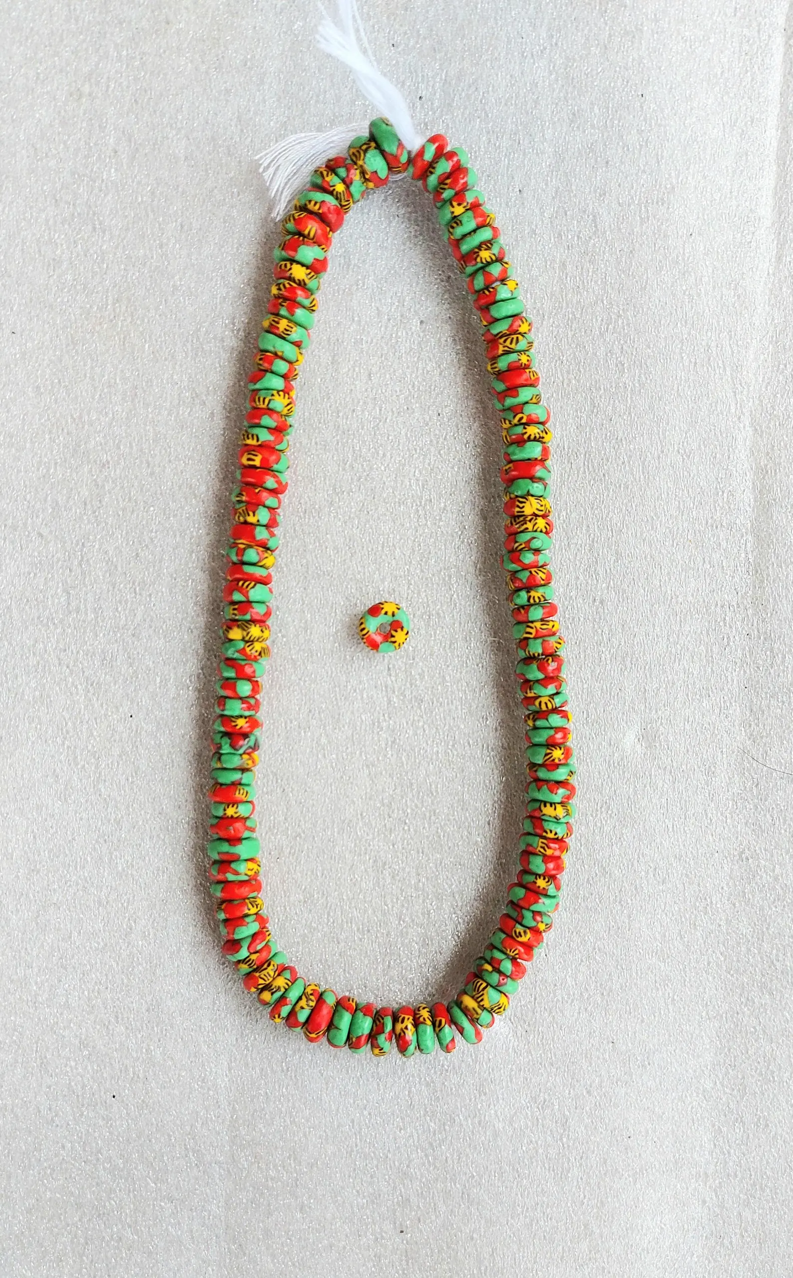 100+ African melted glass spacers, rondelle beads, 10-11 mm.diameter 100+ African melted glass spacers, rondelle beads, 10-11 mm.diameter