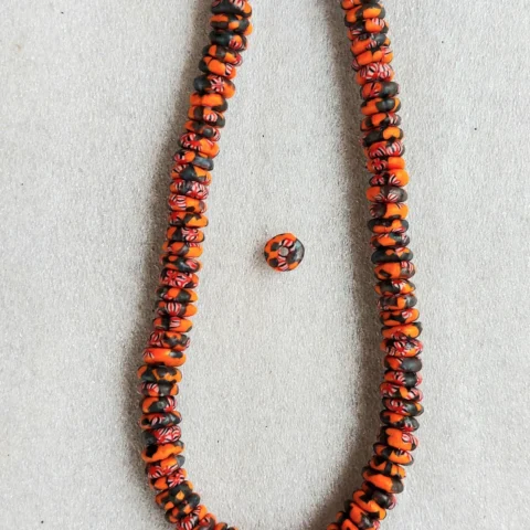 100+ African melted glass spacers, rondelle beads, 10-11 mm.diameter