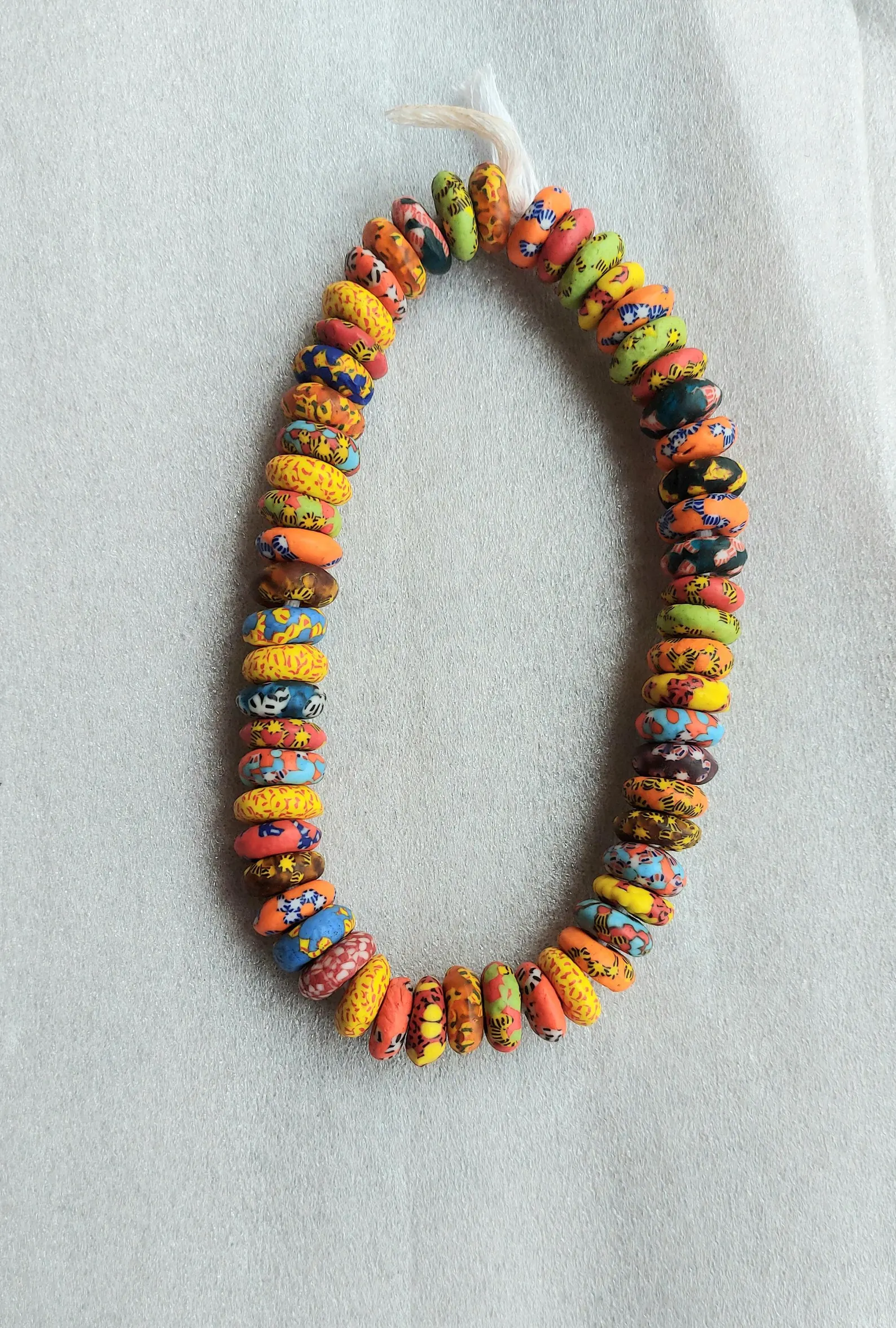 56 African melted glass spacer beads, rainbow rondelle beads, 18 mm.diameter 56 African melted glass spacer beads, rainbow rondelle beads, 18 mm.diameter