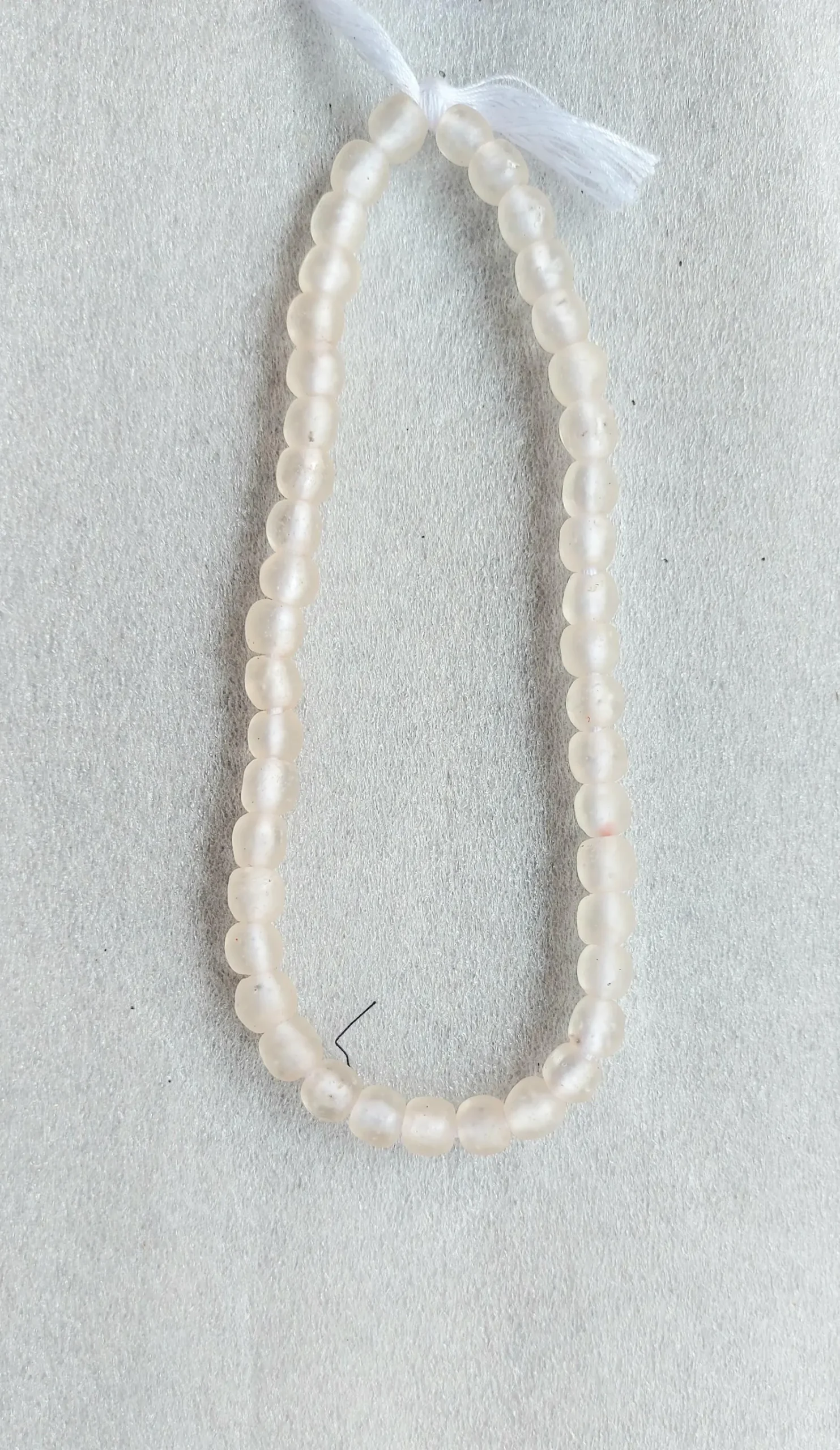 42-43 recycled glass beads. translucent white 42-43 recycled glass beads. translucent white