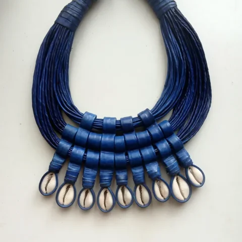 Handwoven leather and cowrie shell necklace