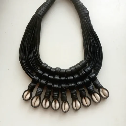 Handwoven leather and cowrie shell necklace