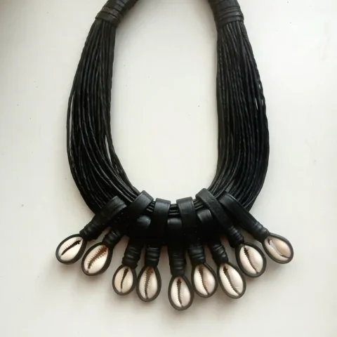 Handwoven leather and cowrie shell necklace